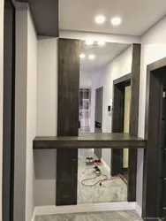 Built-in mirror in the hallway photo