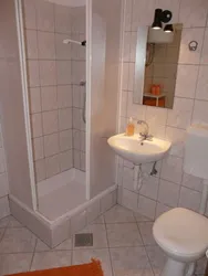 Bathroom With Shower Made Of Tiles In Khrushchev Design Photo