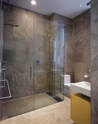 Bathroom with shower made of tiles in Khrushchev design photo