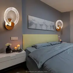 Modern wall lamps for the bedroom above the bed photo