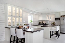Photo of a kitchen with a white table