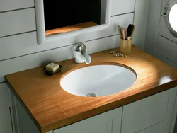 Раковина на столешнице в ванной комнате фото