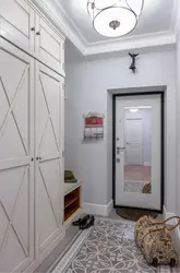 Hallway design in a house with a door