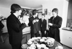 Photo of the beatles in the kitchen