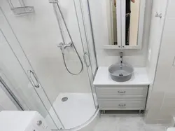 Bathroom with shower in Khrushchev photo cabin and washing machine