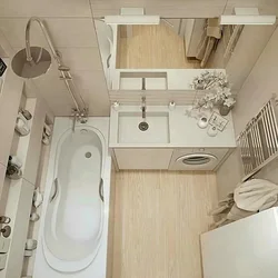 Interior of a bathroom with a bathtub without a toilet with a washing machine