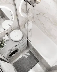 Interior Of A Bathroom With A Bathtub Without A Toilet With A Washing Machine
