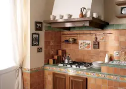 Apron in the kitchen made of tiles photo of apartments