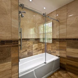 Bathroom bathtub with glass photo