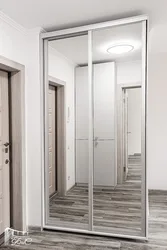 Sliding wardrobe in the hallway two-door with mirror design