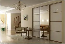 Design of built-in wardrobes in the hallway with mirrors