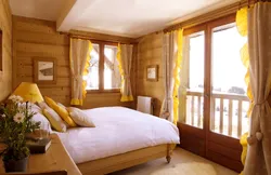 Interior of a bright bedroom in a wooden house