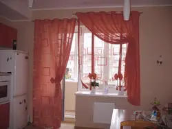 Photo of a window with a balcony in the kitchen photo