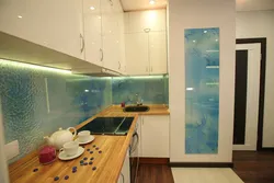 Glass apron for the kitchen interior photo