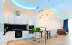 Stretch ceiling design in a studio kitchen