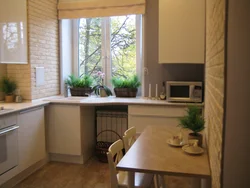 Design Of A Small Kitchen In A House With A Window