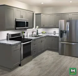 Gray refrigerator in the kitchen interior photo