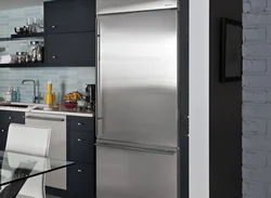 Gray refrigerator in the kitchen interior photo