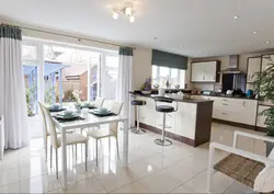 Rectangular kitchen living room with access to the terrace photo