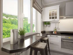 Kitchen combined with window sill photo