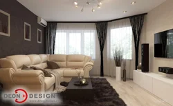 Дизайн гостиной с темным диваном в квартире