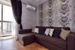 Living room design with dark sofa in apartment