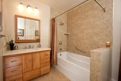 Bathroom design with decorative plaster and tiles photo