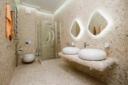 Bathroom design with decorative plaster and tiles photo