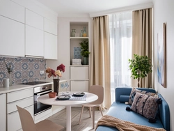 Rectangular Kitchen Design With Sofa And Balcony