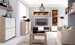 White living room with wood in the interior