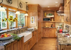 Small kitchen in a wooden house photo