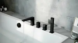 Black bathroom taps in the interior
