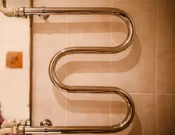 Змеевик в ванную комнату из нержавейки фото