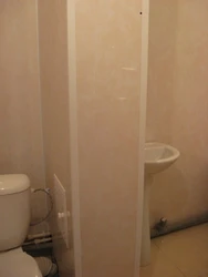 How to hide pipes in the bathroom with panels photo