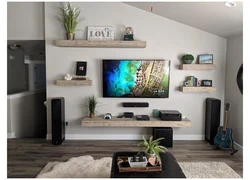 Shelf design above the TV in the living room photo