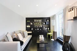 Light apartment design with dark furniture