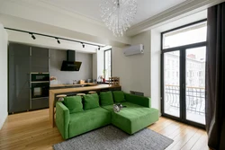 Kitchen living room interior with sofa by the window