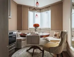 Kitchen Living Room Interior With Sofa By The Window