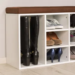 Shoe cabinet in the hallway with a seat photo