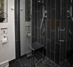 Bathroom design with dark shower