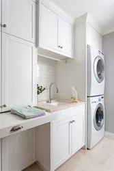 Washing machine and dryer in the bathroom interior