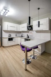 Corner kitchen design with table