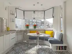 Дизайн кухни в своем доме с эркером