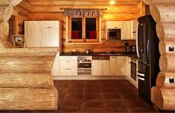 Photo of a kitchen made of rounded logs
