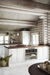 Photo of a kitchen made of rounded logs