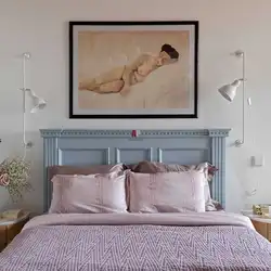 Large paintings in the bedroom above the bed photo