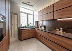 Combined white kitchen with wood photo