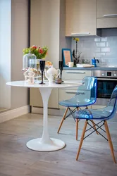 Different chairs in the kitchen in the interior photo