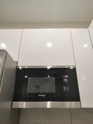 Built-in microwave in the kitchen photo