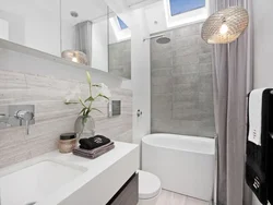 Design of a bathroom with a bathtub in a panel house apartment
